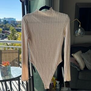 Elegant Cream Ribbed Bodysuit